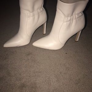 Brand new never worn size 7 off white ruched booties.